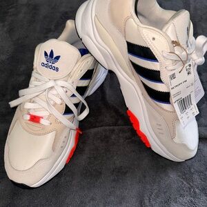 Adidas Cream Sneakers with Black and Blue Stripes